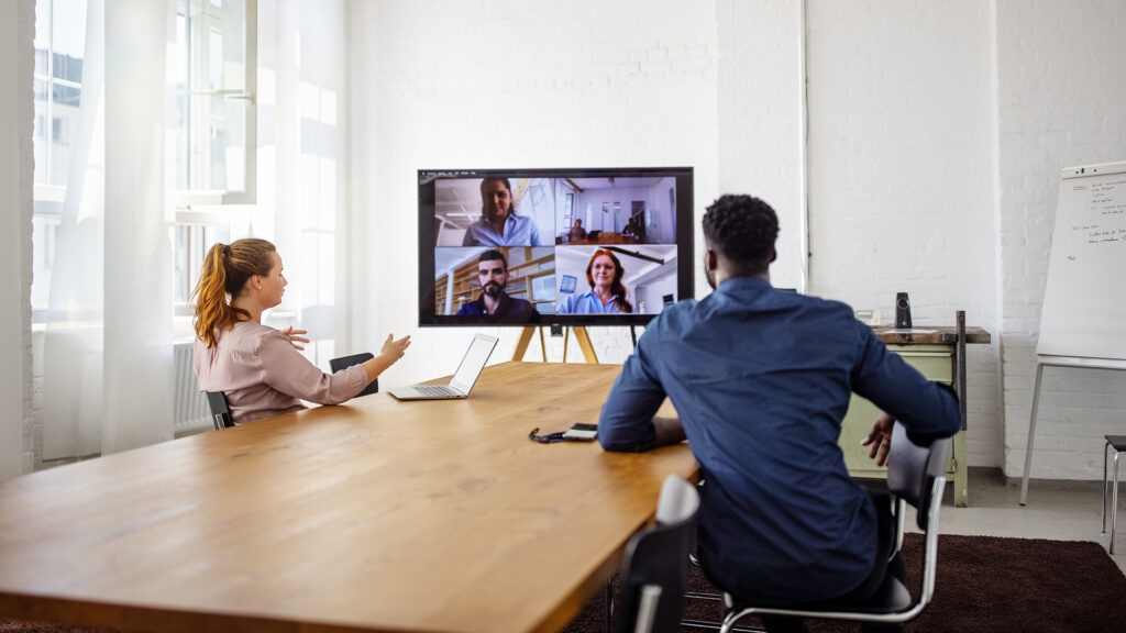 Businesspeople having a video conference in office