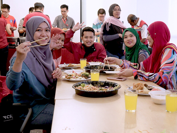 CSG employees sitting together at lunch