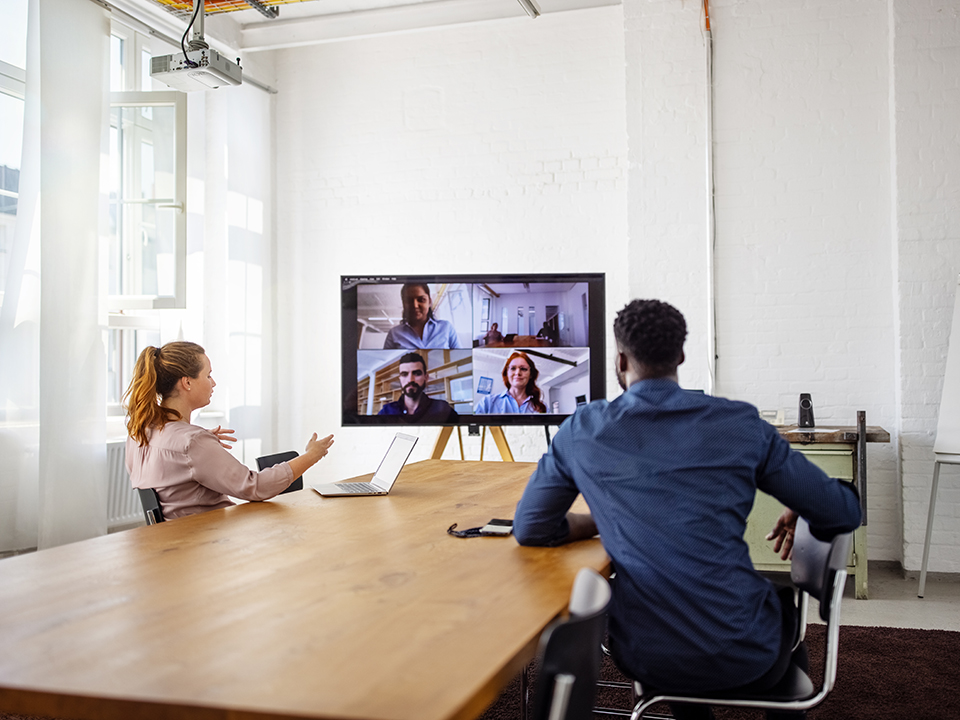 Businesspeople having a video conference in office