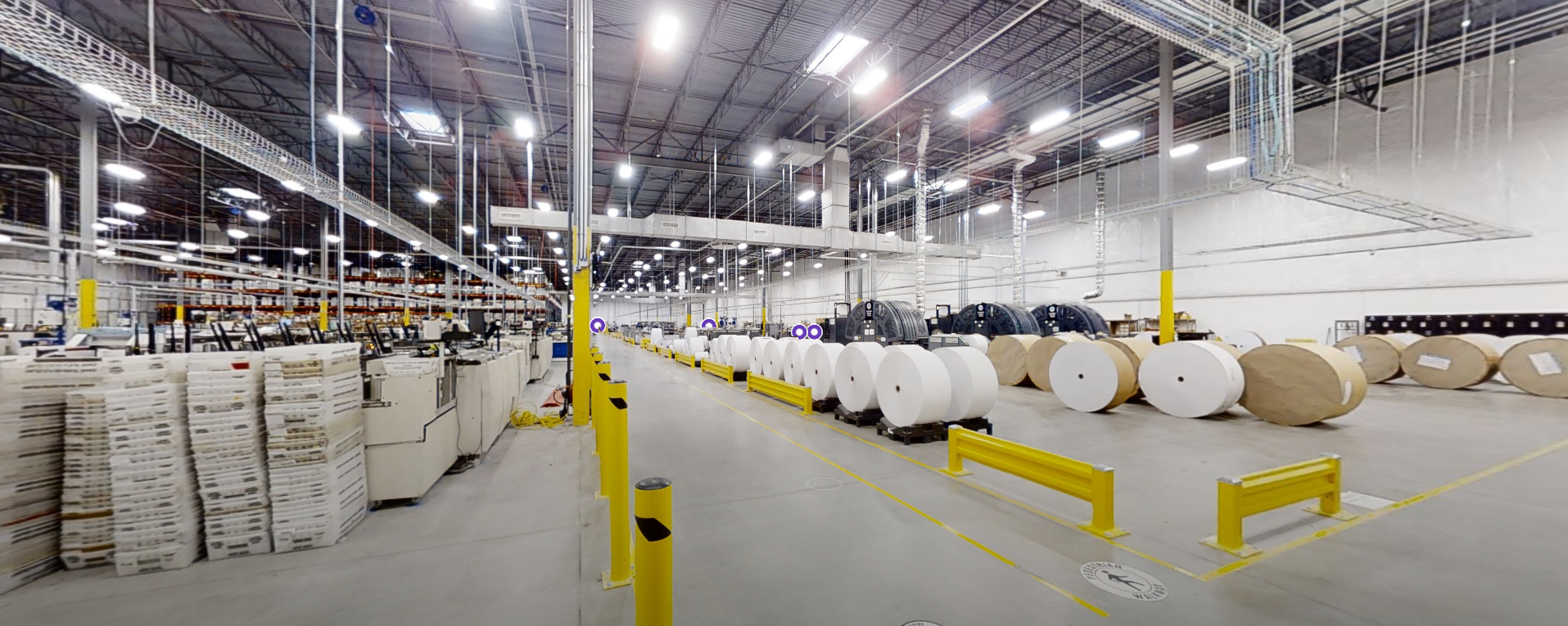 Interior view of a large industrial printing facility.