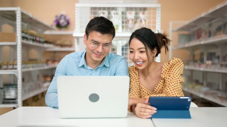 Business owners are analyzing and discussing business data