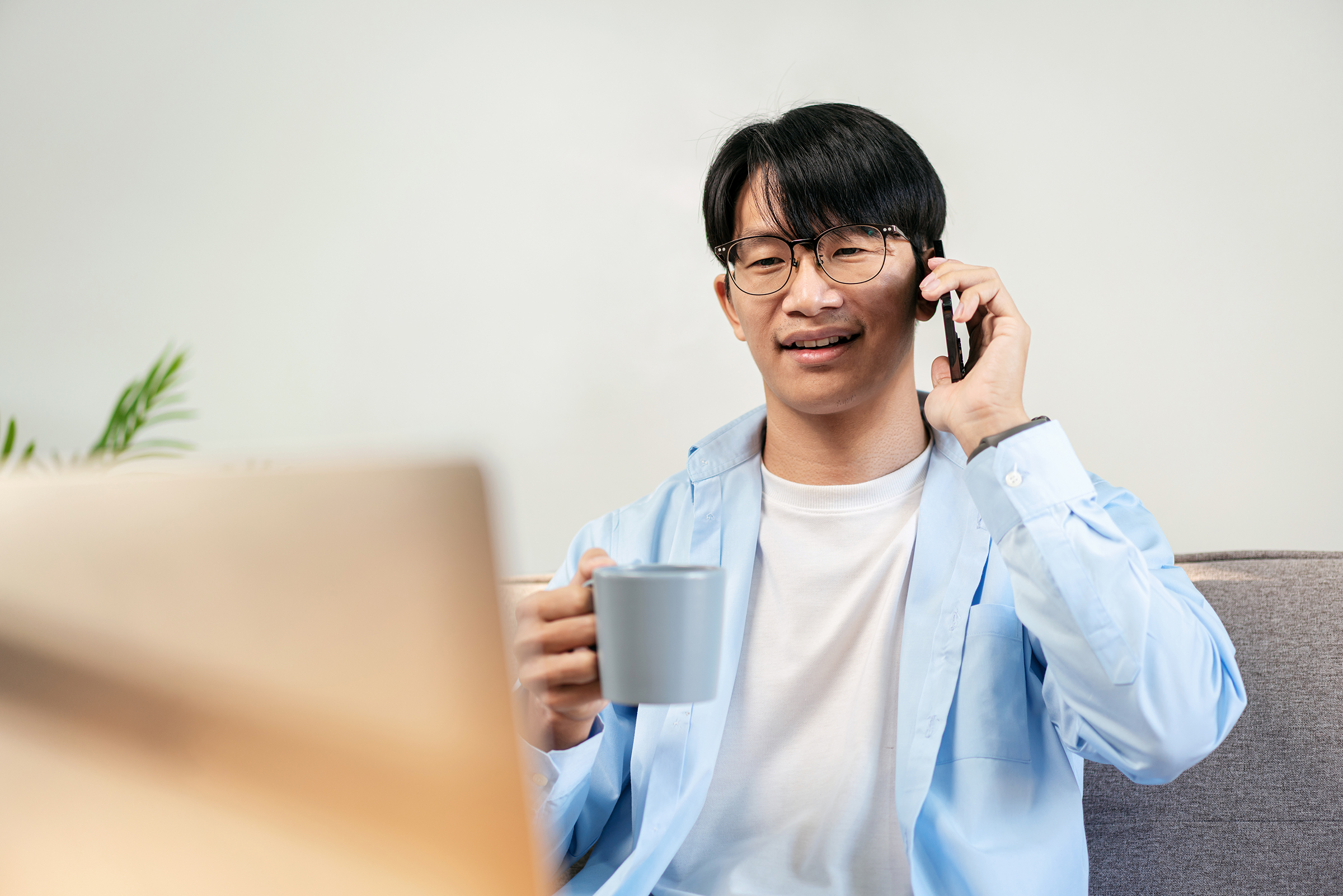 businessman in casual is sitting comfortable sofa