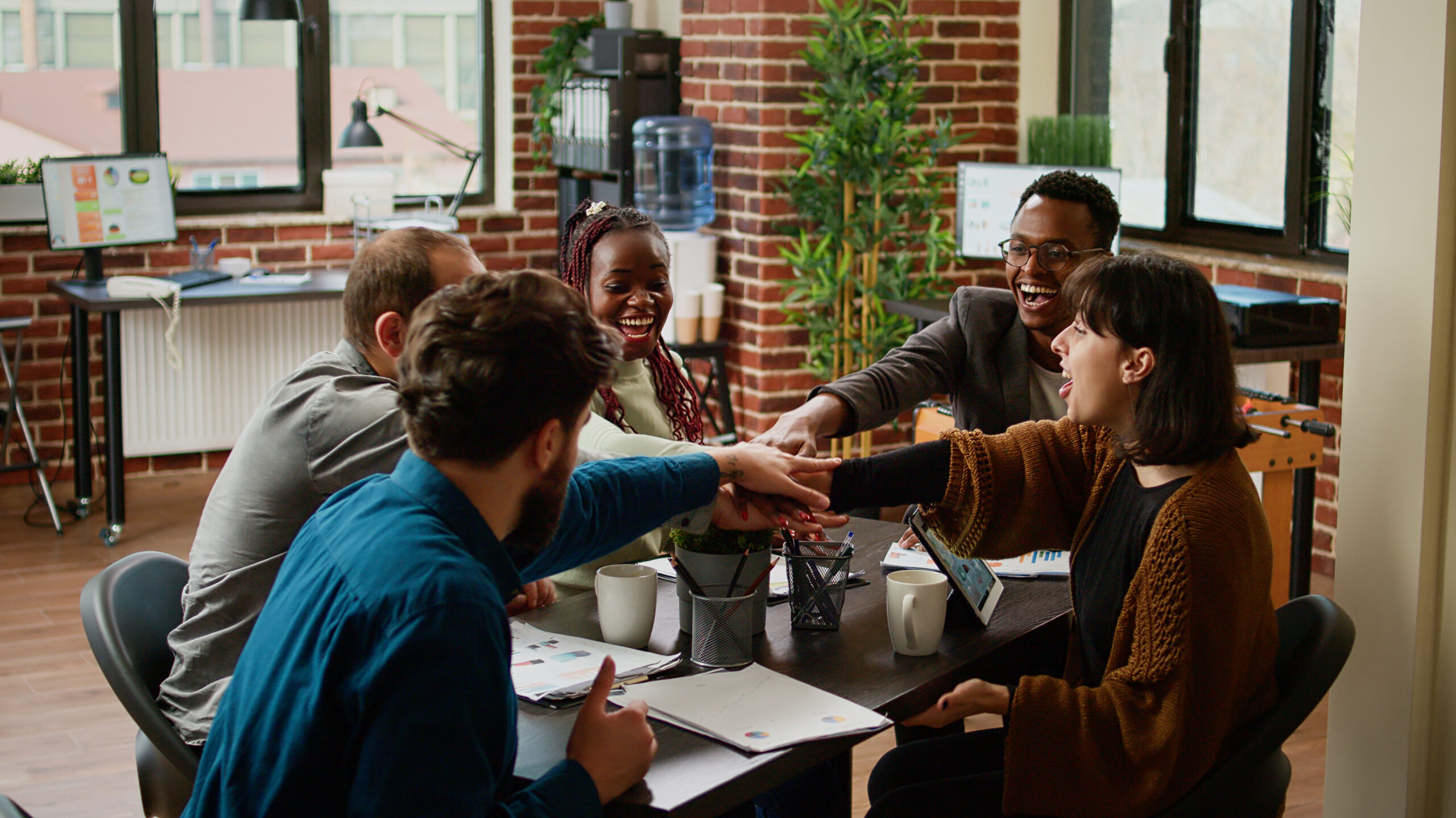 Cheerful business people celebrating a success