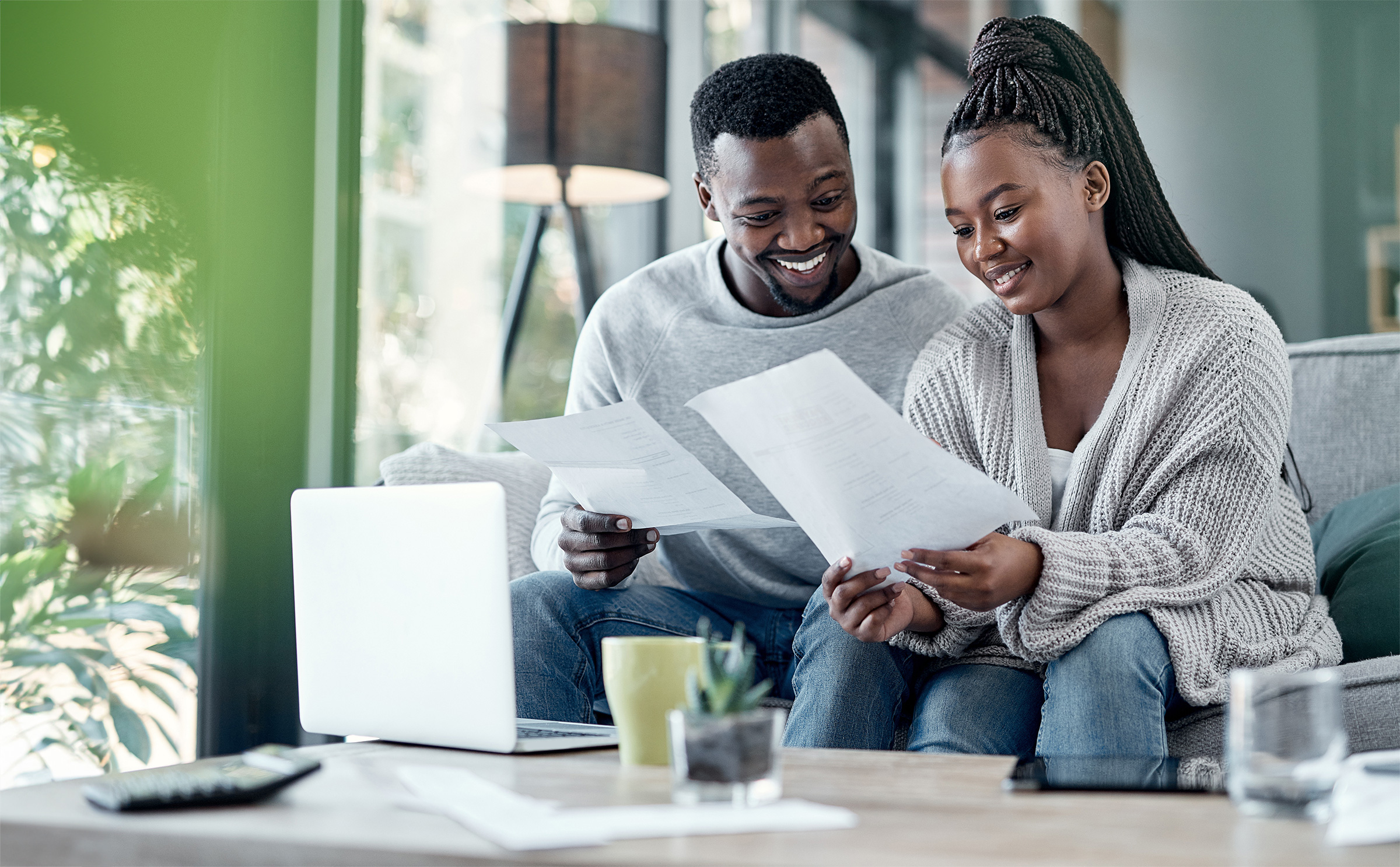 Couple reviewing bills and finances together