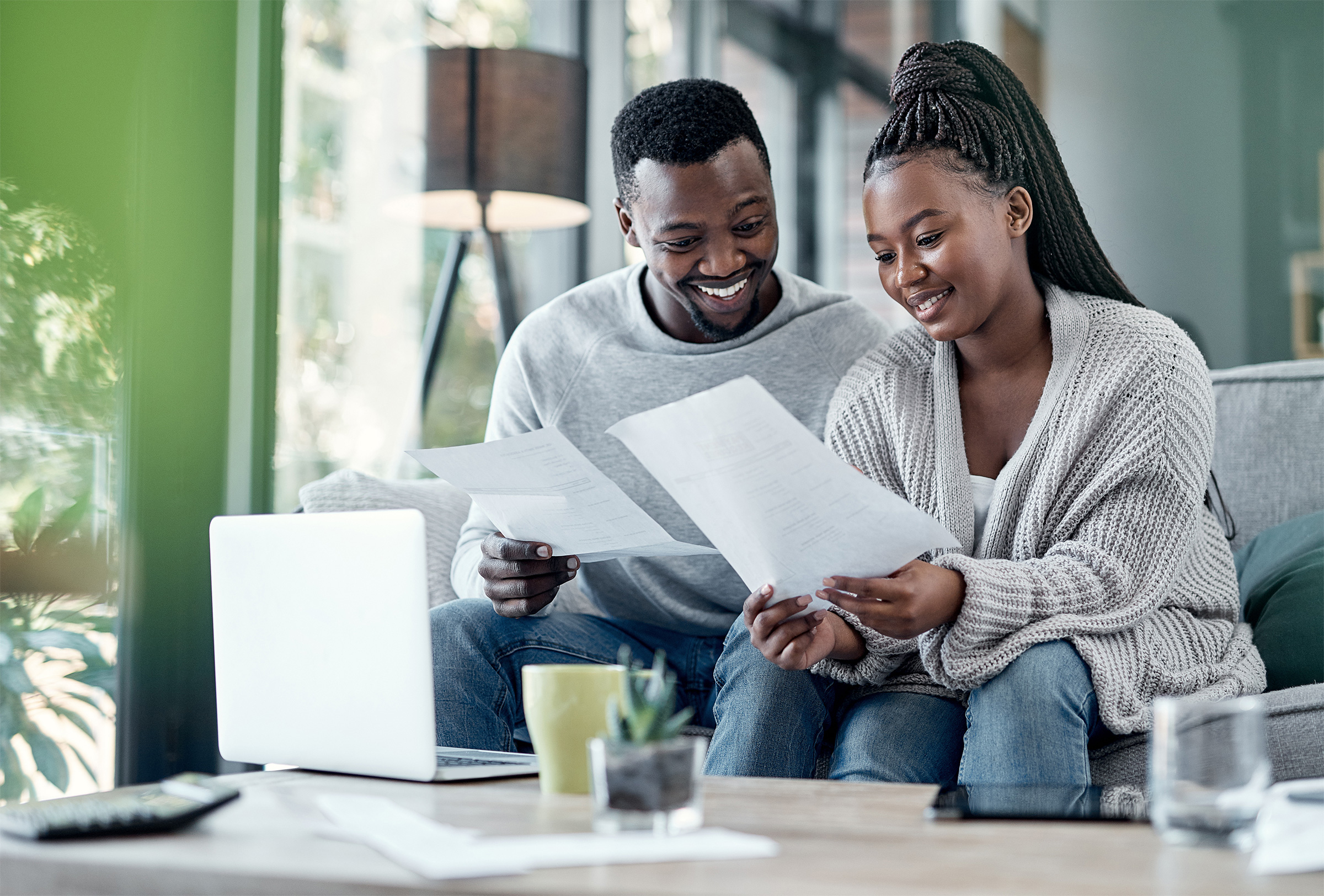 Couple reviewing bills and finances together