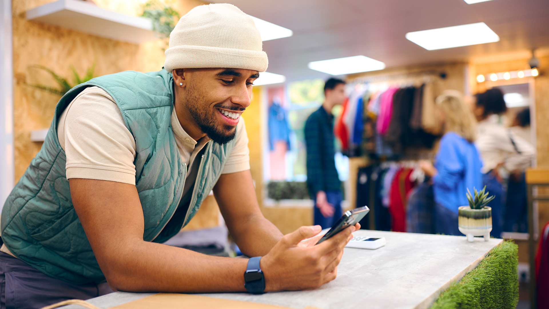 male sales assistant on phone