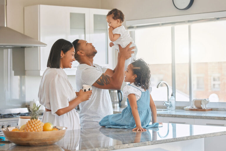 Happy family together in kitchen