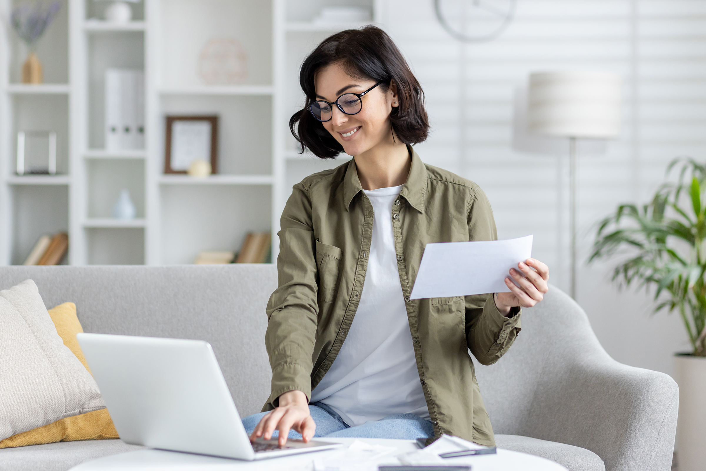 professional woman working from home with laptop