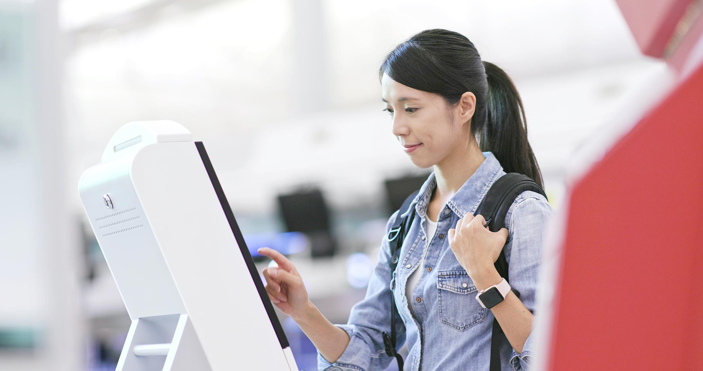 Student using self-service kiosk